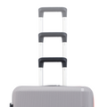 Grey hard-shell suitcase with stacked carry handles and telescopic handle