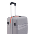 Grey upright suitcase with black handle, orange side stripe, and rigid shell