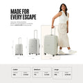 White suitcase trolley with telescopic handle and large ridged shell, spinner wheels