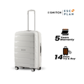 Light grey check-in trolley with telescopic handle, ridged shell, and corner spinner wheels.