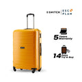 Yellow polypropylene large check-in trolley front view with carry handle and four wheels