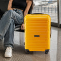 Snitch Loop medium polypropylene trolley in yellow, smooth shell with four wheels