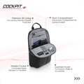 Black crossbody backpack open to show tech compartment, hidden pocket, and essentials pocket.
