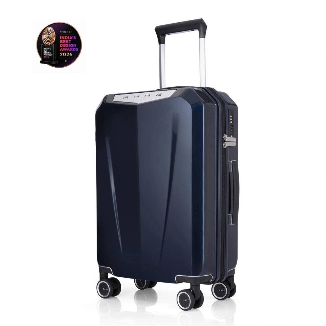 Hard-shell trolley suitcase, dark blue polycarbonate shell with telescopic handle and four wheels