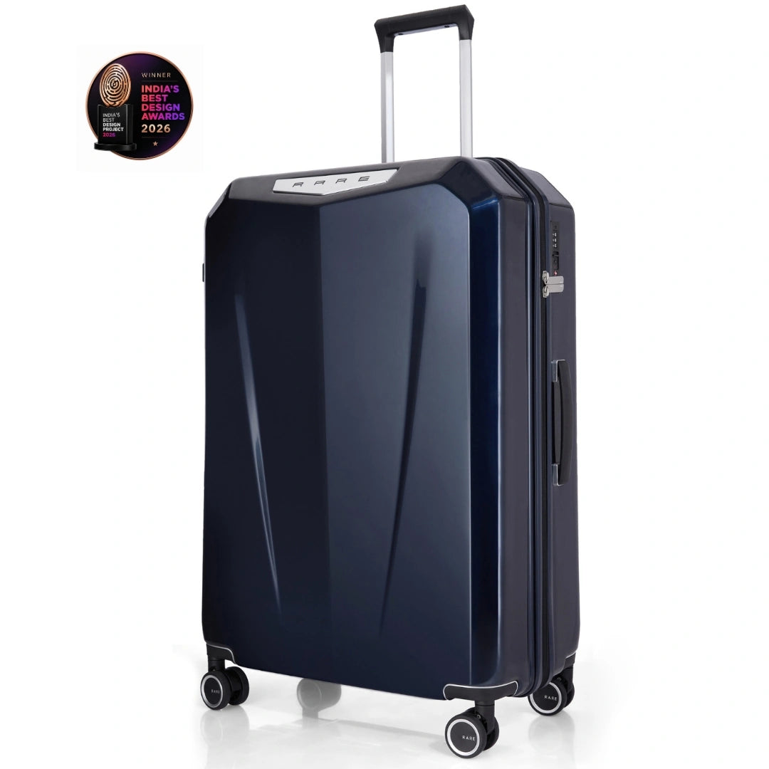 Hard-shell trolley suitcase, dark blue polycarbonate shell with telescopic handle and caster wheels