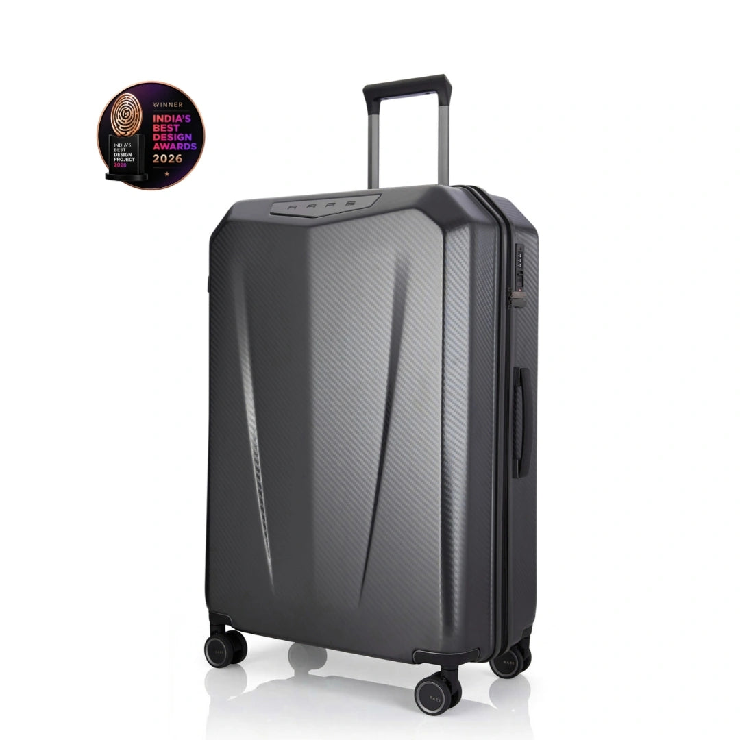 Hard-shell trolley suitcase, dark grey polycarbonate shell with telescopic handle and four wheels