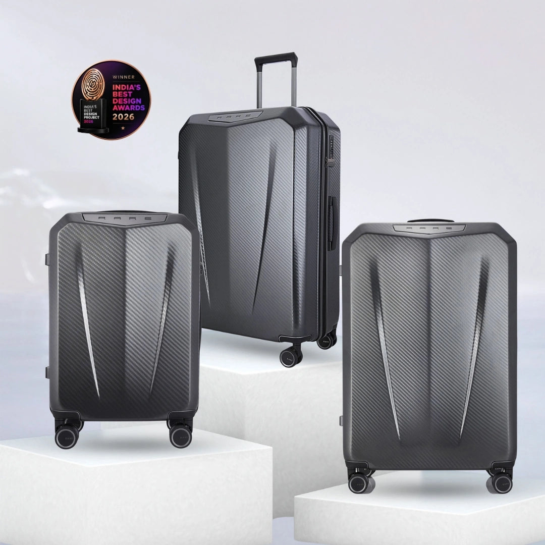 Set of hard-shell trolley suitcases, dark grey polycarbonate with telescopic handles and wheels