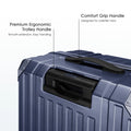 Blue suitcase comfort grip handle on ribbed polycarbonate shell