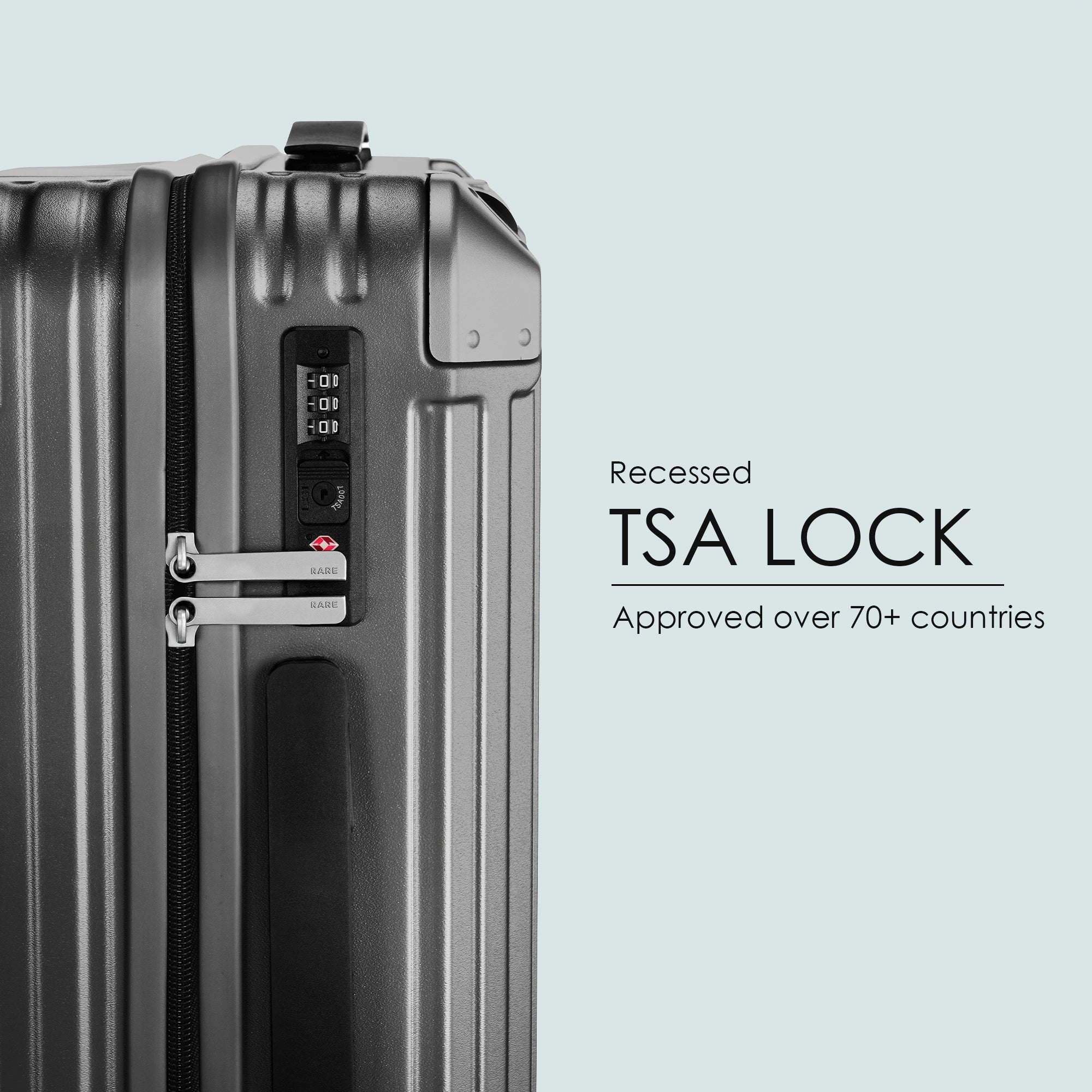 Charcoal grey suitcase side with recessed TSA lock and combination dial panel