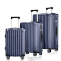 Three-piece polycarbonate spinner luggage set in blue with telescopic handles and wheels