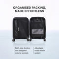 Hard-shell polycarbonate trolley luggage open with organizers, dividers, and cross-ribbon system