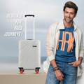 HRX small cabin suitcase, white shell with red-trim edge and 8 spinner wheels