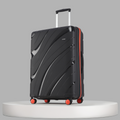 Black hard-shell suitcase with 8 wheels, red trim, and upright telescopic handle.