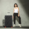 Black hard-shell check-in suitcase with 8 wheels, curved ridges, and upright handle.