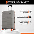 Medium check-in suitcase with retractable handle, spinner wheels, and ribbed hard shell