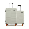 Hard-shell luggage set of 2, cream, two cases with extended handles and 8 wheels.
