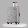 Large check-in suitcase, hard shell, grey color, telescopic handle, 8 wheels, red accents