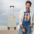 Cream small cabin suitcase with telescopic handle, ribbed shell, and orange wheels