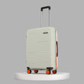 Medium check-in suitcase front view with telescopic handle and four spinner wheels, ribbed shell