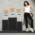 Small cabin suitcase set in dark finish with telescopic handle and red wheels