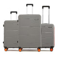 3-piece hard-shell luggage set in grey with 8 spinner wheels and stackable handles