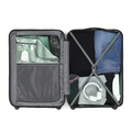 Two open charcoal hard-shell suitcases with organizer pockets and compression straps.