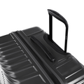 Dark grey hard-shell suitcase corner with top handle and side zipper