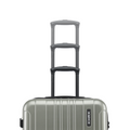 Dark silver medium suitcase close-up with stacked handles and ribbed hard-shell front
