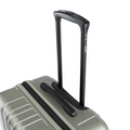 Silver suitcase top carry handle with black grip, plus latch on ribbed side