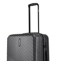 Charcoal gray hard-shell suitcase with ribbed ridges and side zipper details, telescopic handle