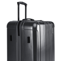 Charcoal grey large check-in suitcase front corner with ridged texture and carry handle
