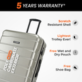 Large check-in suitcase with light metallic shell and accessory storage compartments