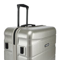 Silver suitcase front view with recessed handle, logo patch, and zip edge