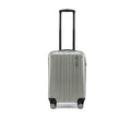 Small cabin suitcase with silver shell, vertical ridges, and 4 corner wheels.