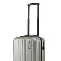 Small cabin suitcase with silver-green shell, extended trolley handle, and front corner detail.