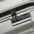 Small cabin suitcase with TSA-style combo lock detail and black zipper pull