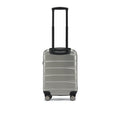 Silver small cabin suitcase with telescopic handle, back view with wheels.