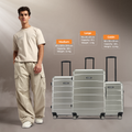 Silver large check-in suitcase with telescopic handle and four corner wheels