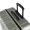 Hard-shell suitcase top handle and zipper seam, ridged shell design