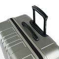 Large check-in suitcase, dark green ridged shell with top handle and zip track