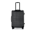 HRX suitcase with telescopic handle, ribbed dark shell, and corner wheels