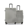 HRX check-in suitcase set: silver-gray pair with upright trolley handles and wheels
