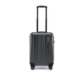 Small cabin suitcase with 8 wheels, charcoal grey, side view with upright handle
