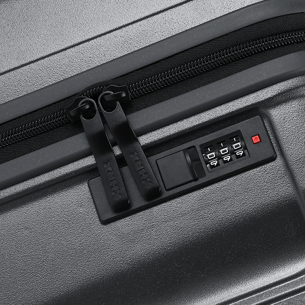 Charcoal grey hard-shell suitcase with combination lock and zip closure