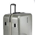 Hard-shell silver suitcase corner with black side handle and ridged shell