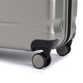 Hard-shell suitcase with 360-degree spinner wheels and side corner bumper