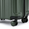 Small cabin suitcase with dark green wheels and corner bumper detail