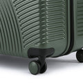 Hard-sided suitcase, dark green ribbed shell, front vent detail, four spinner wheels