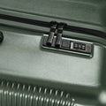 Large check-in suitcase side panel with combination lock and zip pocket
