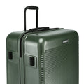 Dark green hard-shell suitcase corner with telescopic handle and ridged shell